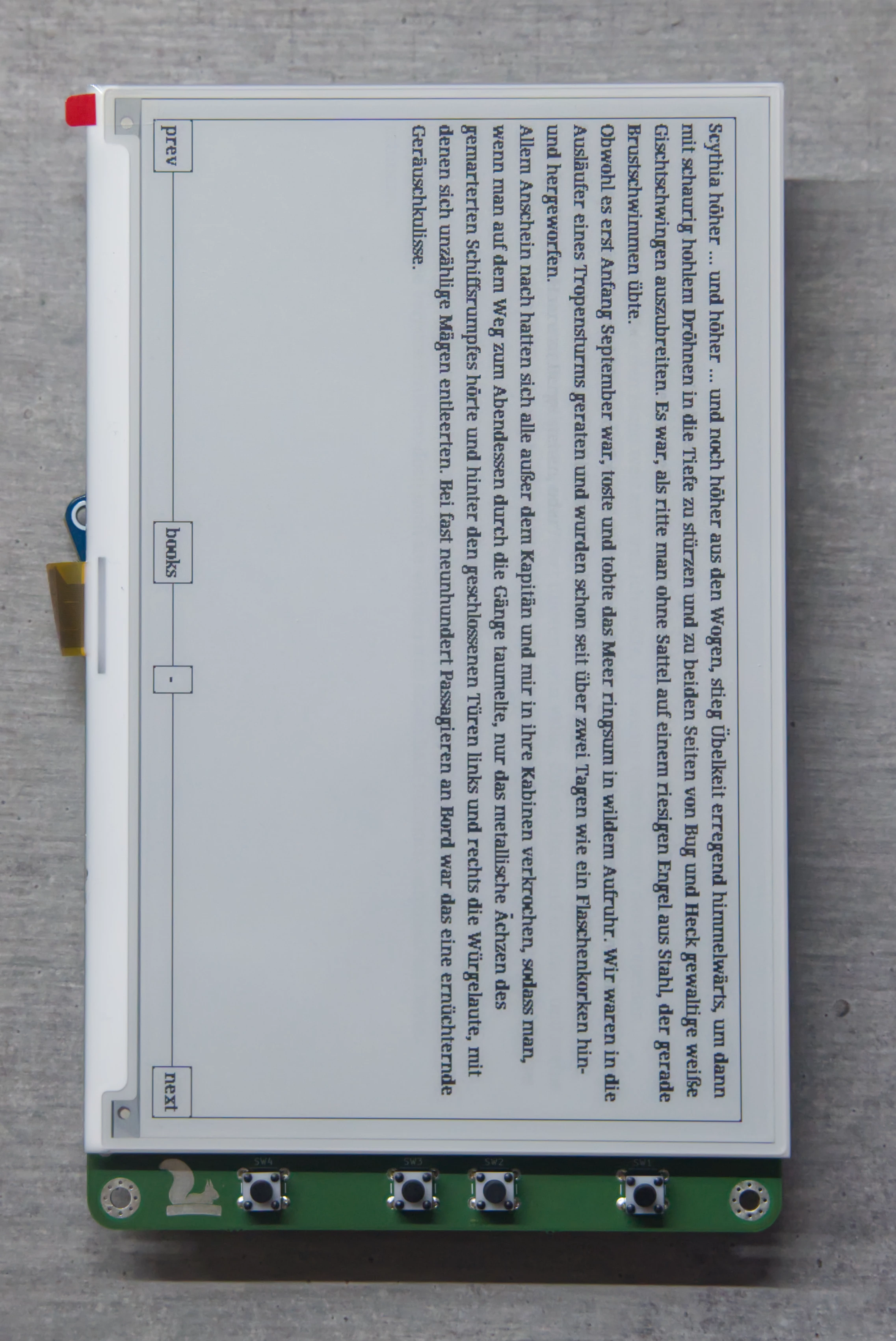 The assembled ZEReader device, with display and PCB. There is no enclosing yet and the text is 90 degrees rotated.