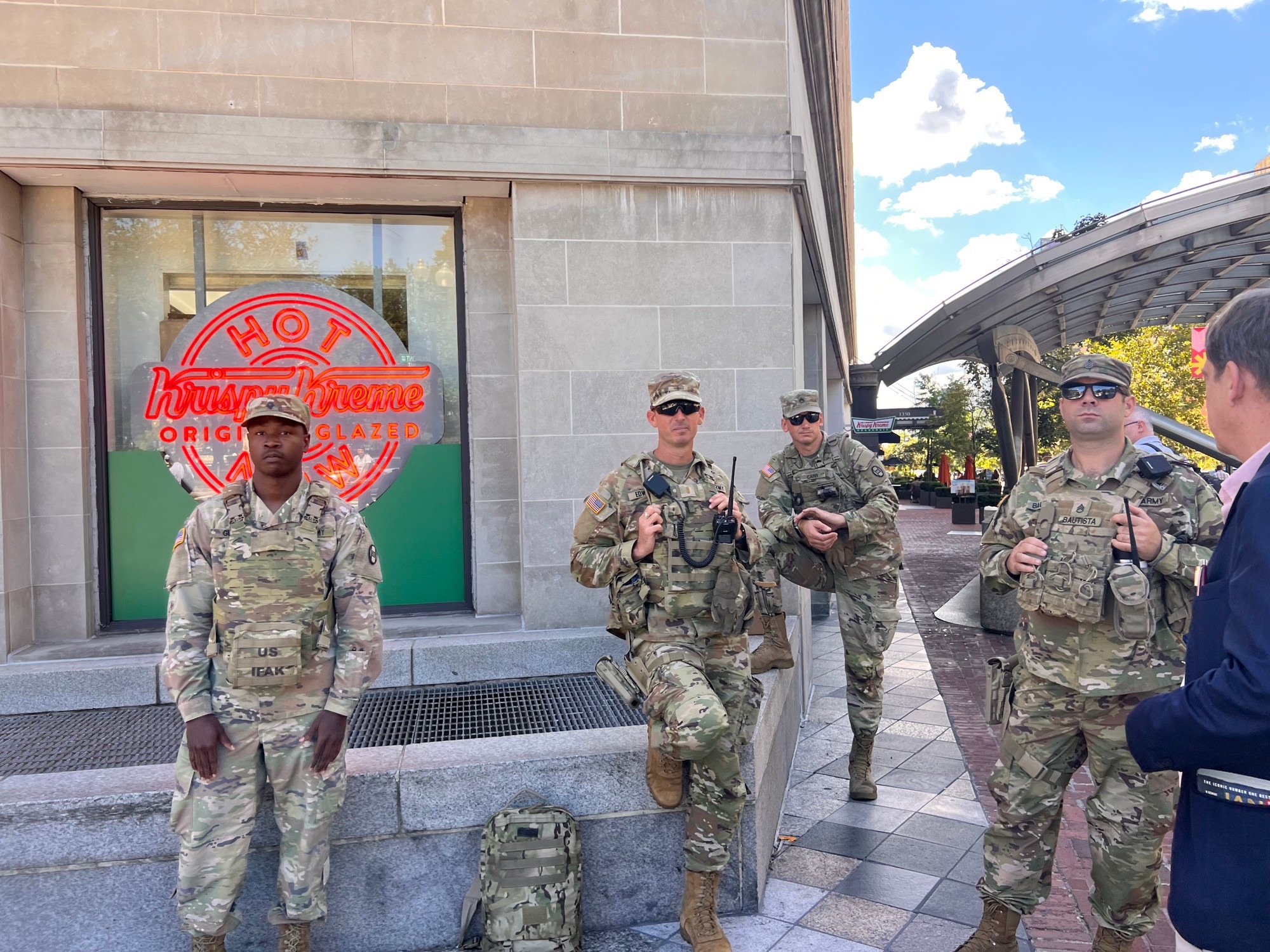 National guard troops lounging outside a Krispy Kreme