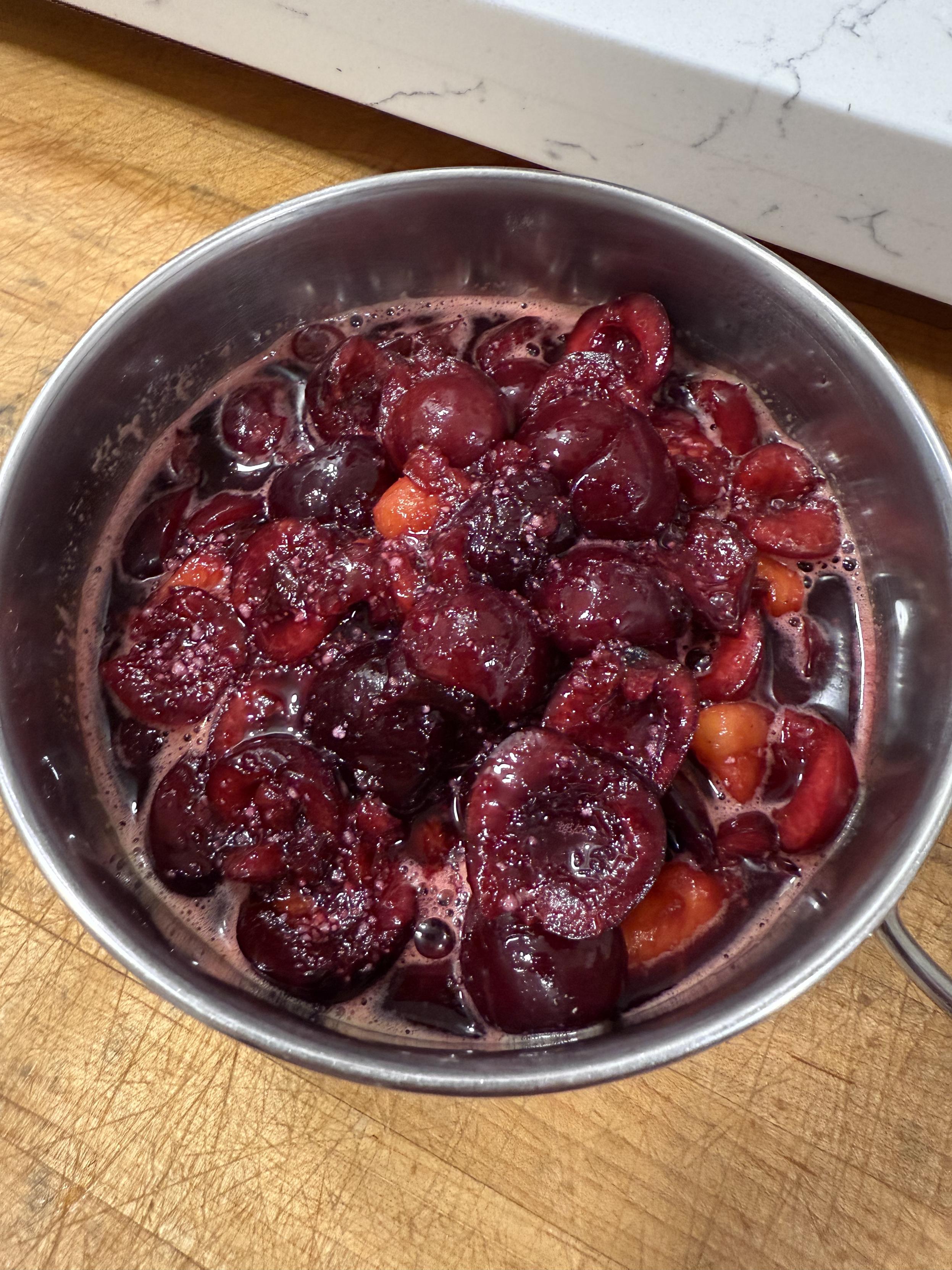 Bowl of cherry peach pie filling.