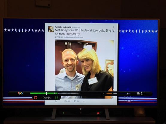 A screenshot of a TiVo playing a recording of the late show with Steven Colbert featuring a tweet on the screen. The tweet has a photo of a man and a blonde haired woman that reads: met at @TaylorSwift13 today at jury duty. She is so nice. #CivicDuty.