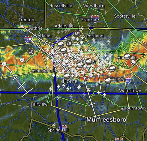 Screenshot of the weather, radar application showing a large storm and thousands of lightning strikes