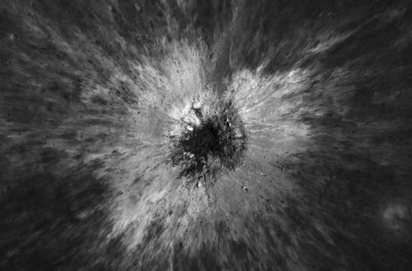 close up of a new crater on the moon. black and white